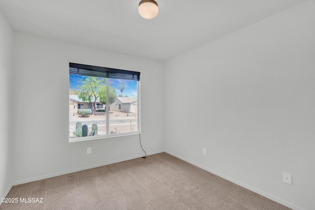 8972 E Mcmurray Pl, Tucson, AZ 85730 - empty room with carpet floors and baseboards