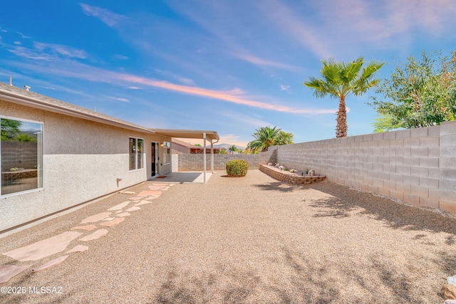 8972 E Mcmurray Pl, Tucson, AZ 85730 - fenced backyard with a patio area