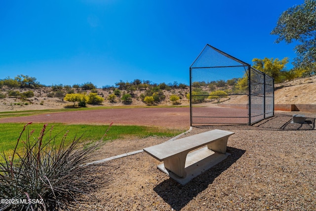view of community with fence