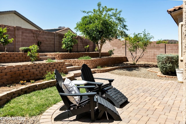 view of patio with a fenced backyard
