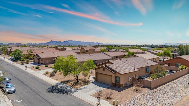 bird's eye view featuring a mountain view and a residential view