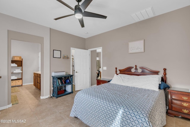 bedroom featuring light tile patterned floors, visible vents, baseboards, and a ceiling fan