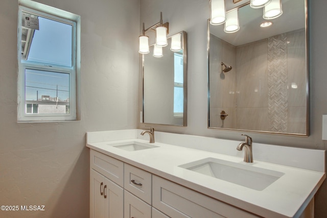 full bath featuring a sink and plenty of natural light