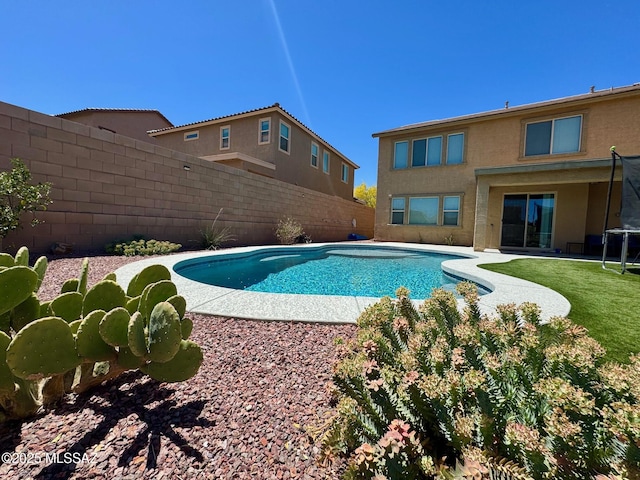 view of swimming pool featuring a fenced in pool and a fenced backyard