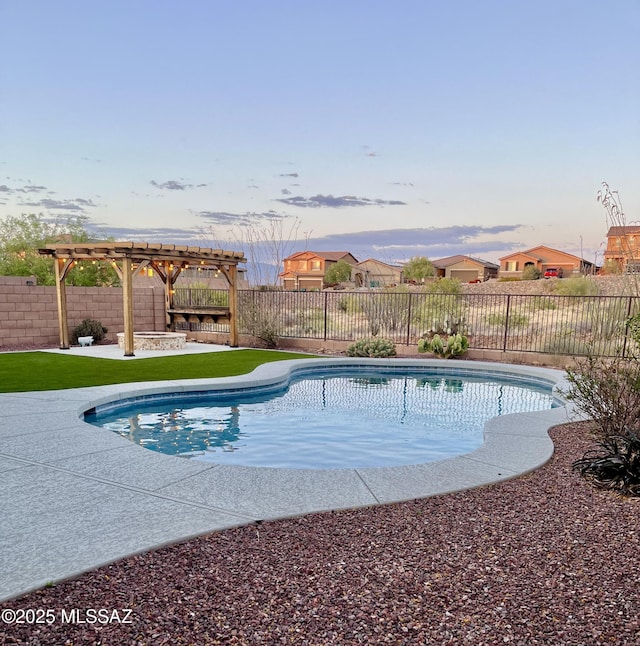 view of pool featuring a fenced in pool, a pergola, a fenced backyard, and a patio area