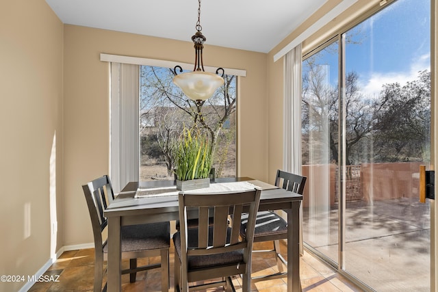 13792 E Langtry Ln, Tucson, AZ 85747 - dining area featuring baseboards