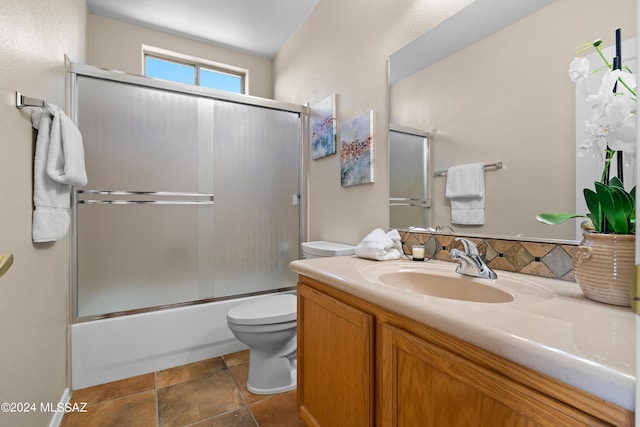 13792 E Langtry Ln, Tucson, AZ 85747 - full bathroom featuring enclosed tub / shower combo, vanity, and toilet