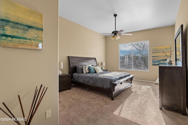 13792 E Langtry Ln, Tucson, AZ 85747 - bedroom with carpet flooring, baseboards, and ceiling fan