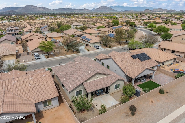 bird's eye view with a residential view and a mountain view
