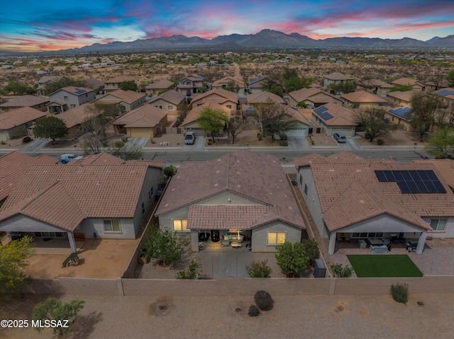 drone / aerial view with a residential view and a mountain view