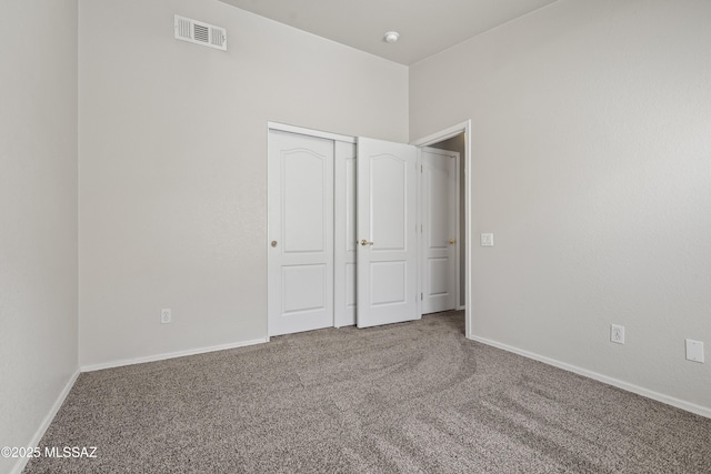 2253 W Catalina View Dr, Tucson, AZ 85742 - unfurnished bedroom with carpet, a closet, baseboards, and visible vents
