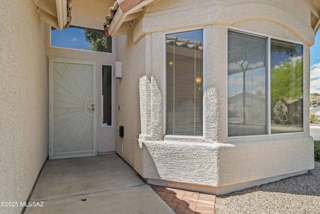 2253 W Catalina View Dr, Tucson, AZ 85742 - view of exterior entry with stucco siding