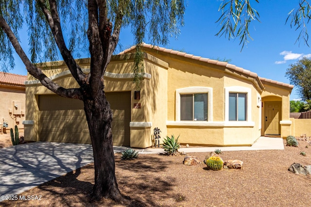 view of property exterior featuring concrete driveway, a tiled roof, an attached garage, and stucco siding
