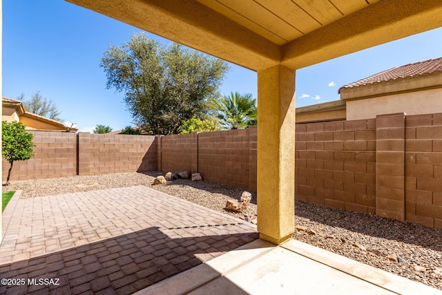 view of patio featuring a fenced backyard