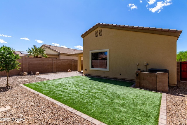 view of yard with a fenced backyard and a patio area