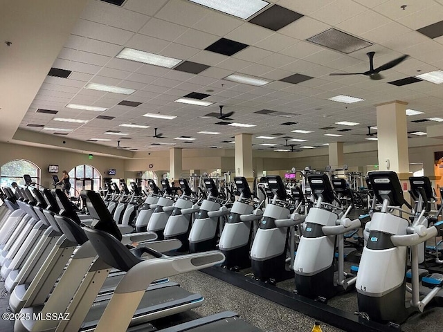exercise room with a drop ceiling