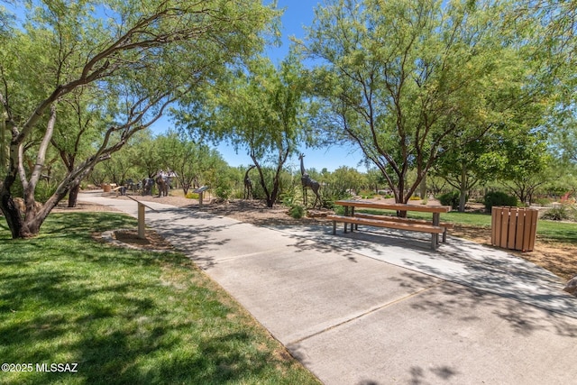 surrounding community with a yard