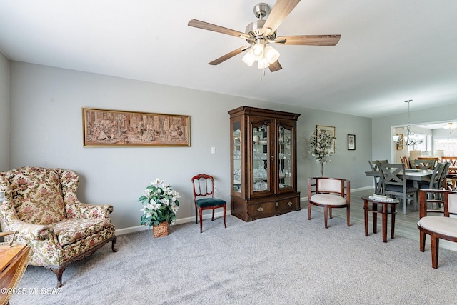 649 W Via, San Mateo, Green Valley, AZ 85614 - sitting room featuring baseboards, a ceiling fan, and carpet floors
