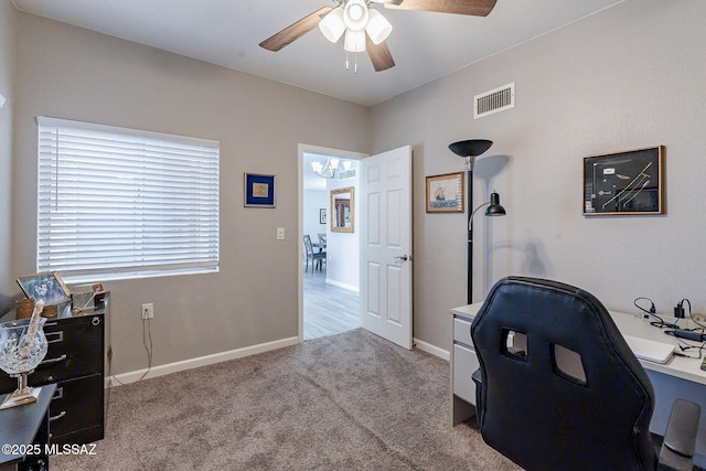 649 W Via, San Mateo, Green Valley, AZ 85614 - carpeted office space featuring ceiling fan with notable chandelier, baseboards, and visible vents