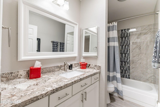 649 W Via, San Mateo, Green Valley, AZ 85614 - bathroom featuring shower / bathtub combination with curtain, vanity, toilet, and wood finished floors