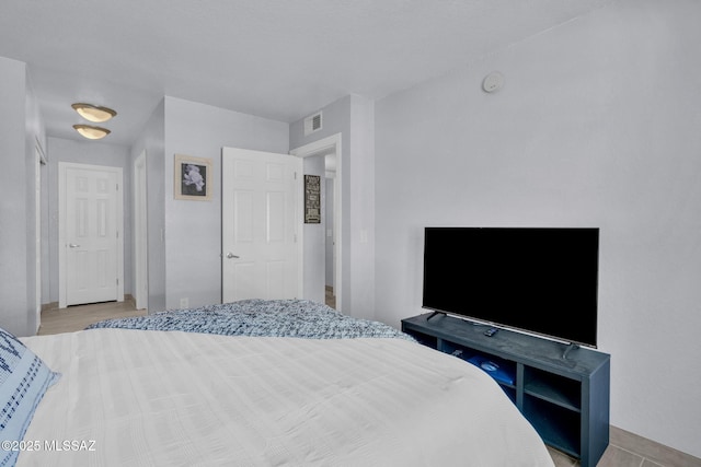 101 S Players Club Dr Unit 12103, Tucson, AZ 85745 - bedroom with baseboards and visible vents