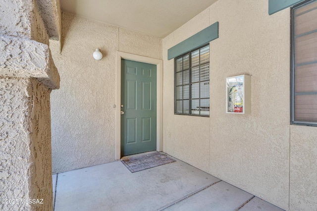 101 S Players Club Dr Unit 12103, Tucson, AZ 85745 - view of exterior entry featuring stucco siding