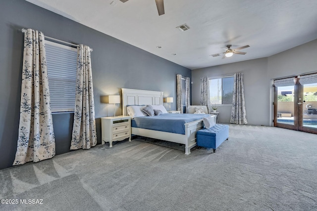 carpeted bedroom with access to outside and ceiling fan