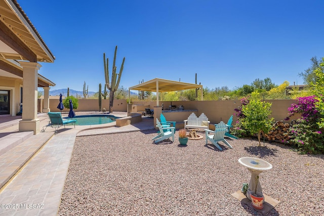 exterior space with a fenced backyard, a fenced in pool, and a patio area