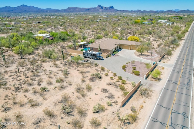 aerial view with a mountain view and a desert view