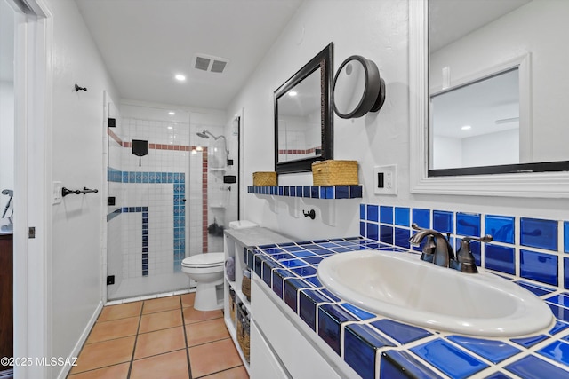 1932 W Harran Cir, Tucson, AZ 85704 - bathroom with toilet, a stall shower, vanity, tile patterned flooring, and recessed lighting