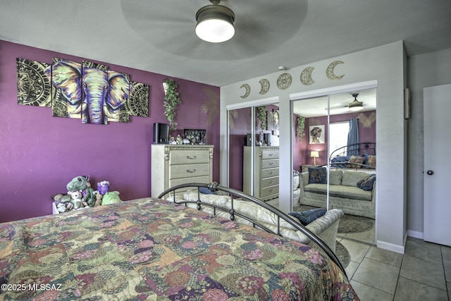 7217 E Fayette St, Tucson, AZ 85730 - bedroom with two closets, tile patterned floors, and a ceiling fan