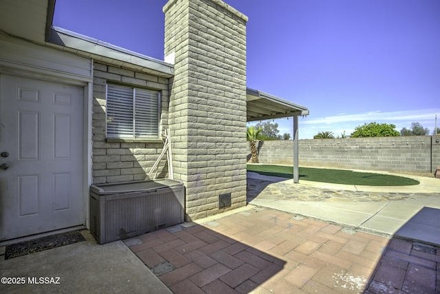 7217 E Fayette St, Tucson, AZ 85730 - fenced backyard featuring a patio area