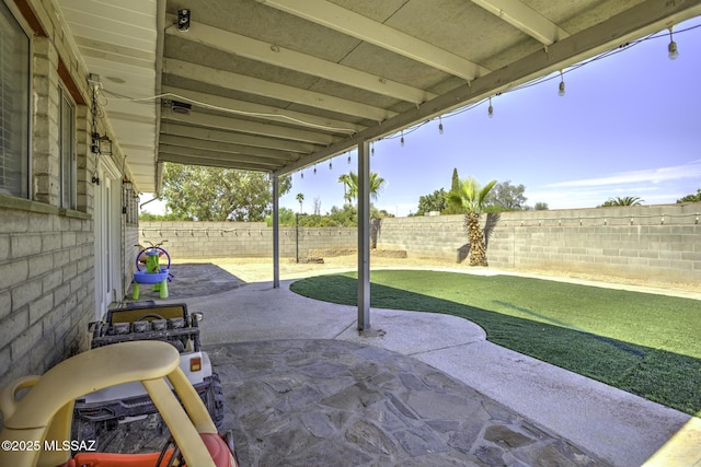 7217 E Fayette St, Tucson, AZ 85730 - fenced backyard featuring a patio
