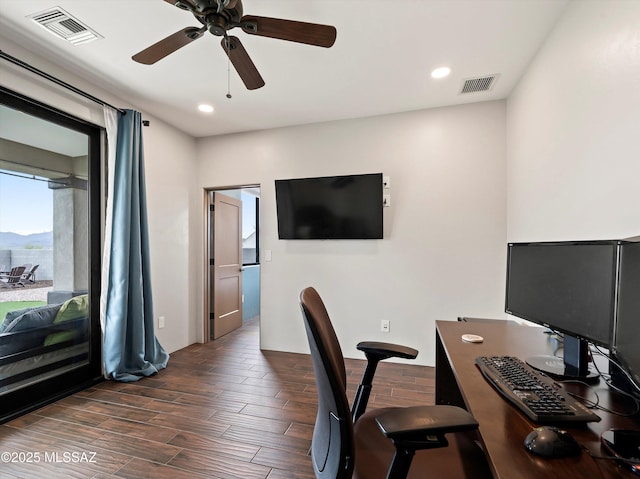 office area with dark wood-type flooring, ceiling fan, visible vents, and recessed lighting