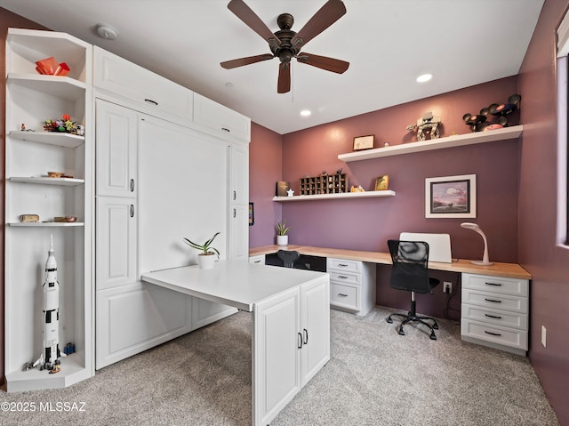 office space featuring recessed lighting, a ceiling fan, and light carpet