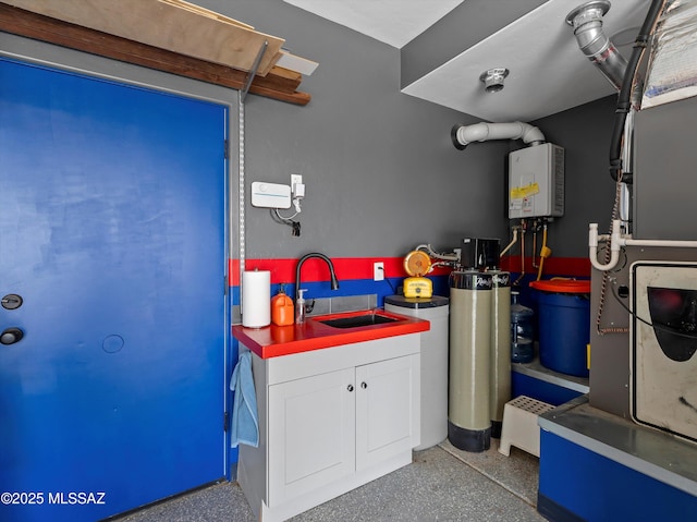 interior space with a sink and water heater