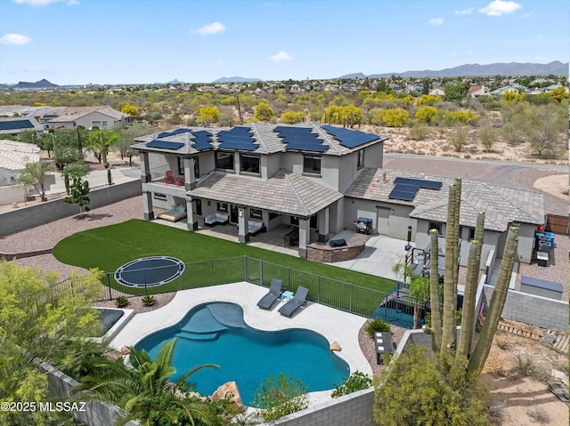 birds eye view of property featuring a mountain view