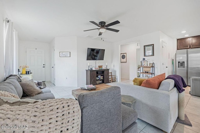 living area with a ceiling fan, baseboards, recessed lighting, and light tile patterned floors