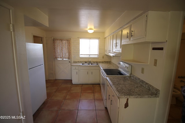 2665 N Leah Pl, Tucson, AZ 85705 - kitchen featuring white appliances, a sink, under cabinet range hood, white cabinetry, and light tile patterned flooring