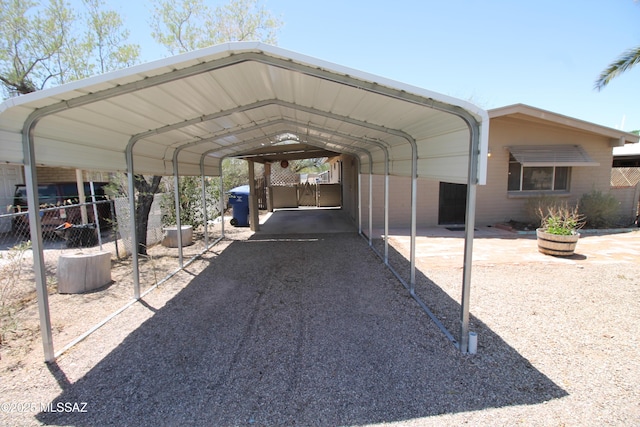 2665 N Leah Pl, Tucson, AZ 85705 - view of parking with a carport and fence