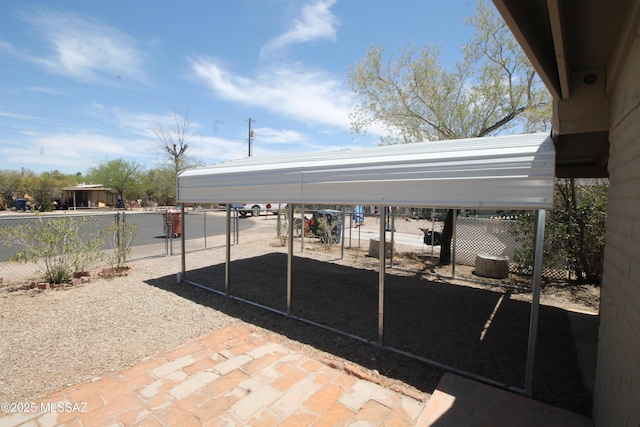 2665 N Leah Pl, Tucson, AZ 85705 - view of patio / terrace with fence and a detached carport