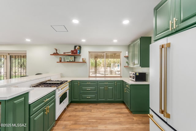 6821 N Cassim Pl, Tucson, AZ 85704 - kitchen with high end appliances, open shelves, plenty of natural light, green cabinets, and recessed lighting