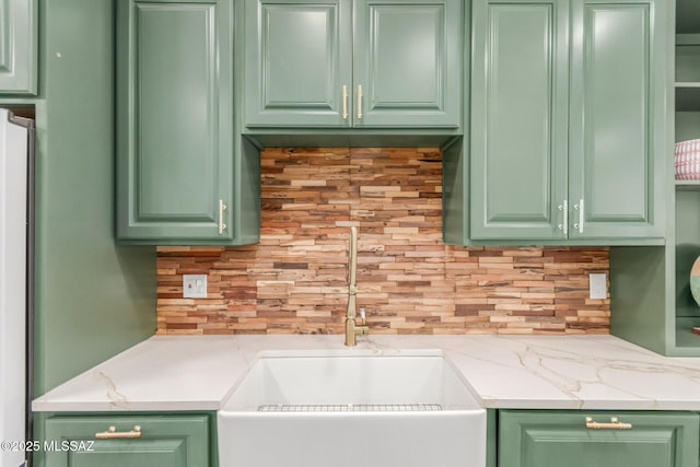 6821 N Cassim Pl, Tucson, AZ 85704 - kitchen with a sink, tasteful backsplash, and light countertops
