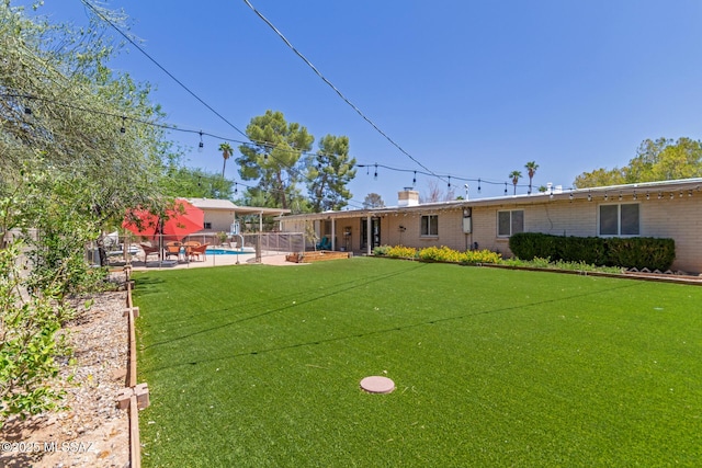 6821 N Cassim Pl, Tucson, AZ 85704 - view of yard with a patio area and a putting area