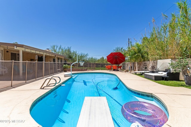 6821 N Cassim Pl, Tucson, AZ 85704 - view of swimming pool featuring a patio, a fenced backyard, and a diving board