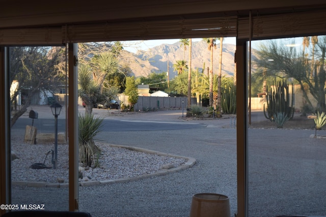 6821 N Cassim Pl, Tucson, AZ 85704 - view of asphalt street featuring a mountain view and street lighting
