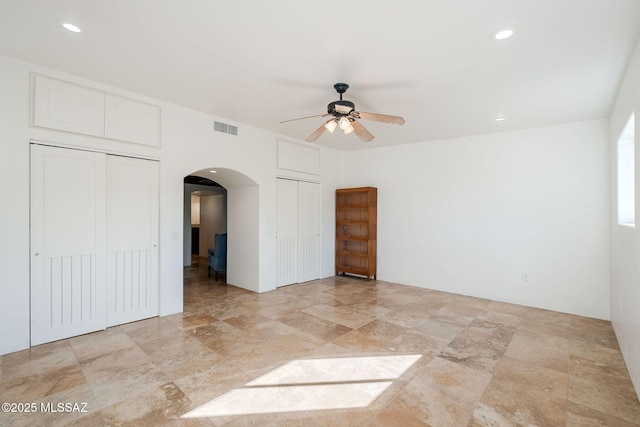 17300 S Camino Cartagena, Sahuarita, AZ 85629 - interior space with visible vents, arched walkways, multiple closets, and recessed lighting