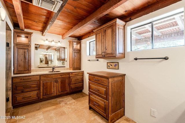 17300 S Camino Cartagena, Sahuarita, AZ 85629 - bathroom with visible vents, wooden ceiling, beam ceiling, and vanity