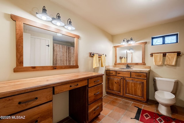 17300 S Camino Cartagena, Sahuarita, AZ 85629 - bathroom featuring vanity, tile patterned floors, and toilet