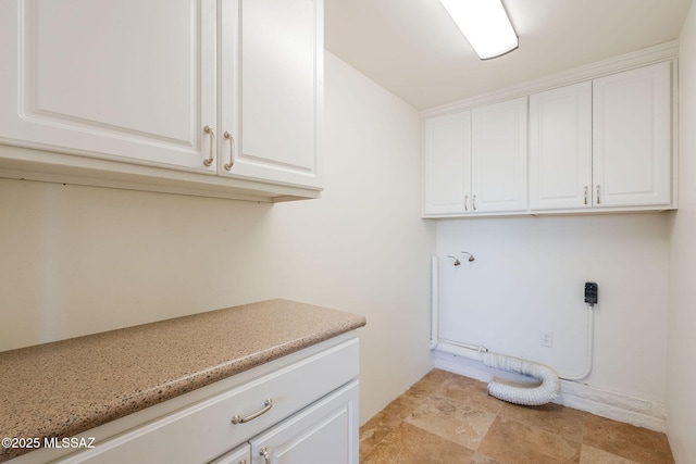17300 S Camino Cartagena, Sahuarita, AZ 85629 - laundry room with hookup for a washing machine and cabinet space